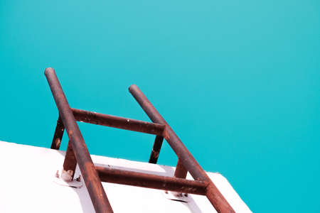 The stairs leading to the bright skyの写真素材