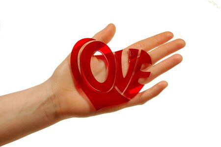 Woman hand holding word loveの写真素材