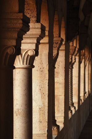 Old colonnade in morning lightの写真素材