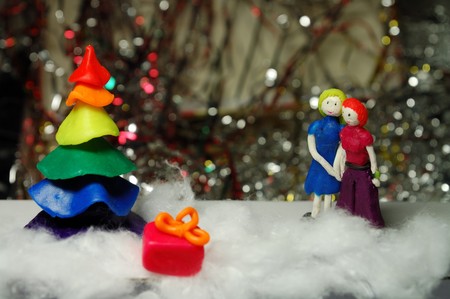plasticine pair and Christmas treeの写真素材