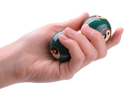 Green Chinese balls for relaxation in woman