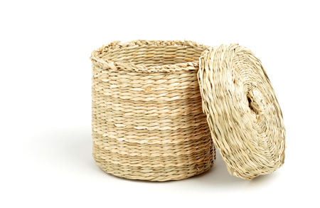 straw cylinder box with cap isolated over white backgroundの写真素材