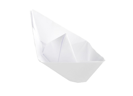 origami  white paper boat isolated over white backgroundの写真素材