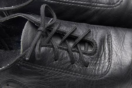 Lacing on a black leather ballroom shoeの写真素材