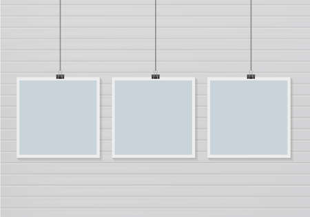 Hanging photo frames on wall background. Vector illustration.
