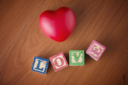 Love and words on the wooden tableの写真素材