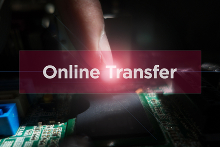 Close-up of electronic circuit board with word: Online Transferの写真素材