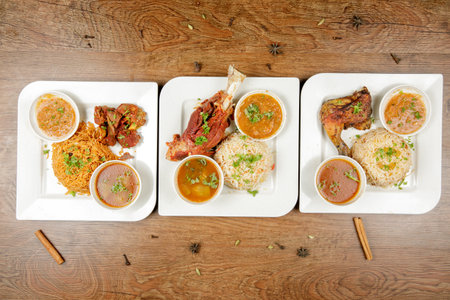 A set of lamb and chicken Mandy Rice, a kind of Arabian main course complete with side dishes
