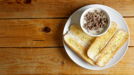 a set of garlic bread with mushroom soupの写真素材