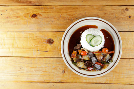 a plate of white rice with mutton soy sauceの写真素材