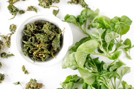 a bowl of fried brazilian spinachの写真素材