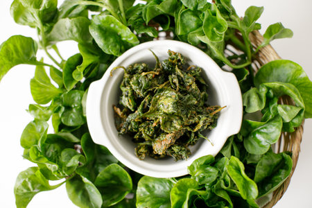 a bowl of fried brazilian spinachの写真素材