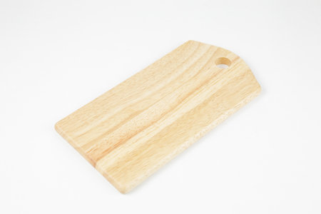 a wood chopping board isolated on white backgroundの写真素材