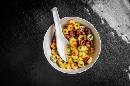 A top view shot of a bowl of colorful cereal.の写真素材