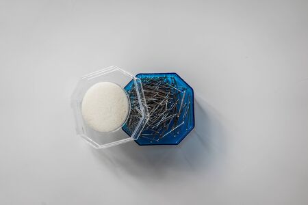 A top view shot of a box of needles.の写真素材
