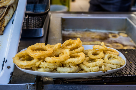A shot of a freshly fried squids ready to serve.の写真素材