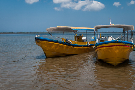 A shot of two boats by the beachの写真素材
