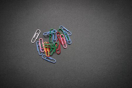 Shot of colourful pins on grey background.の写真素材