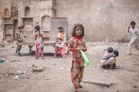 Old Delhi, India : February 15th, 2015 - Shot of children playing at a ruin in Old Delhi, Indiaのeditorial素材