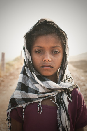 Ajmer, India - 18th February 2015 : Portrait of an indian girl with sadness in her eyes.のeditorial素材