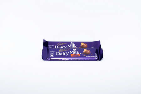 Kuala Lumpur, Malaysia 28 May 2020. Cadbury Dairy Milk Chocolate Roasted Almond With a White Backgroundのeditorial素材
