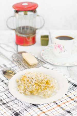 KETAN traditional cake made from cassava and sugar served with hot coffee