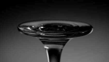 Black and white closeup photo of a glass beakerの写真素材