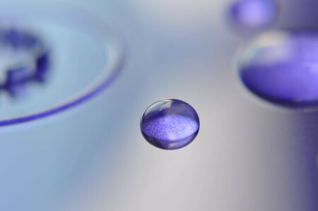 closeup of water drops on blue