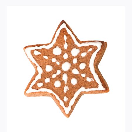 Gingerbread cookie in the shape of star isolated on white backgroundの写真素材