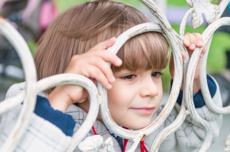 Adorable boy smiling outdoorsの写真素材