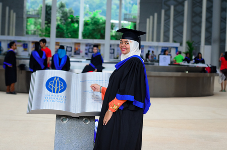 PERAK - OCT 23: 14th Graduation of UTP Students on OCT 23, 2014 in Seri Iskandar, Perak, Malaysia. UTP is one of the top engineering universities in Malaysia owned by PETRONAS.のeditorial素材