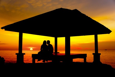 couple silhouette with great sunsetの写真素材