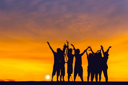 silhouette people on great sunsetの写真素材