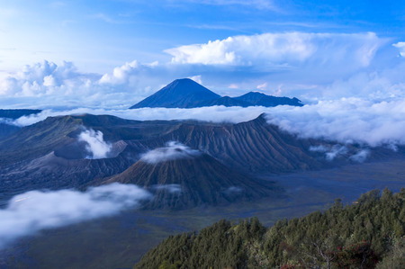 bromo and semeru mountain over the cloudの写真素材