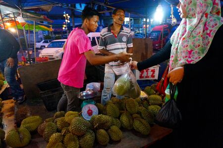 MALACCA-JUNE 8: Local durian at night market on June 8, 2013 in Malacca, Malaysia. The fruit is very popular in some Asian countries, especially in Malaysia and Thailandのeditorial素材
