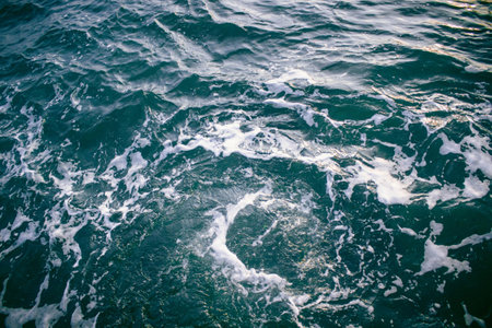 Blue waves with white foamの写真素材