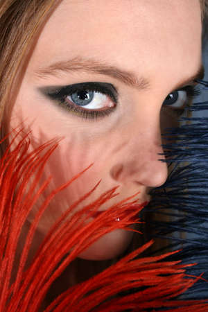Beautiful young female model with dark make-up