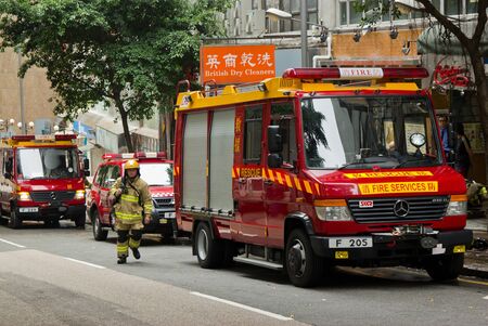 HONG KONG - May 02: Firemen and fire trucks arrive Chai Wan in morning on May 02, 2011 in Chai Wan,...