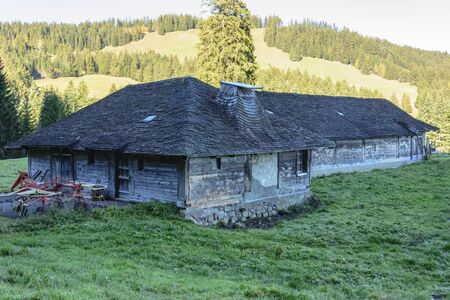 Ancient wooden farm building in Swiss alpsの写真素材