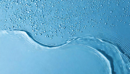 close up of water ripples on the surface of a pink waterの素材