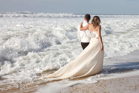 Cute happy couple on the beachの写真素材