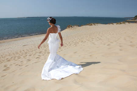 Cute happy couple on the beachの写真素材