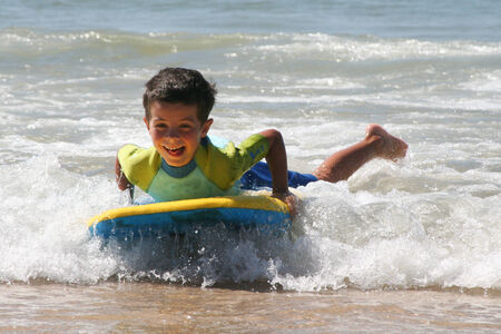 Little boy surfingの写真素材