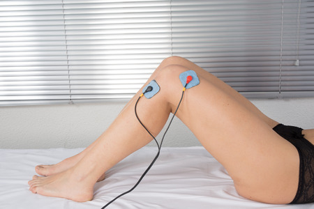 Electrostimulation on thighsの写真素材
