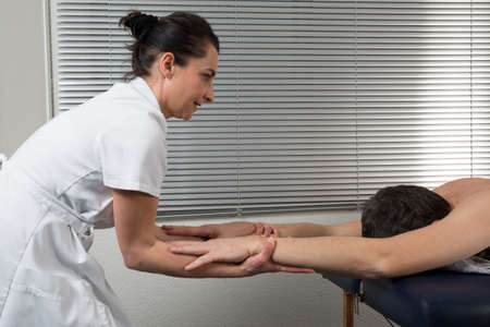 Man receiving back massageの写真素材