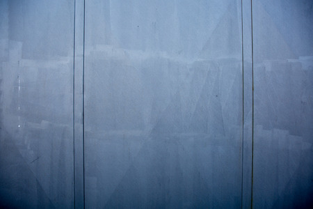 the background of weathered painted wood for designの写真素材