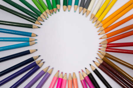 Smiling sun arranged from crayons and pencil sharpenings.の写真素材