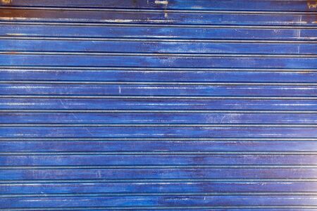 Grunge blue rusty scratched metal background