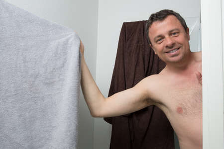 Unshaven man in his bathroomの写真素材