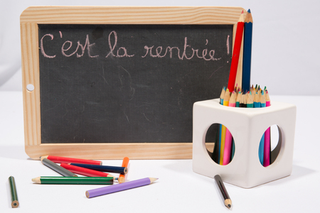 Back to School written in French on blackboardの写真素材